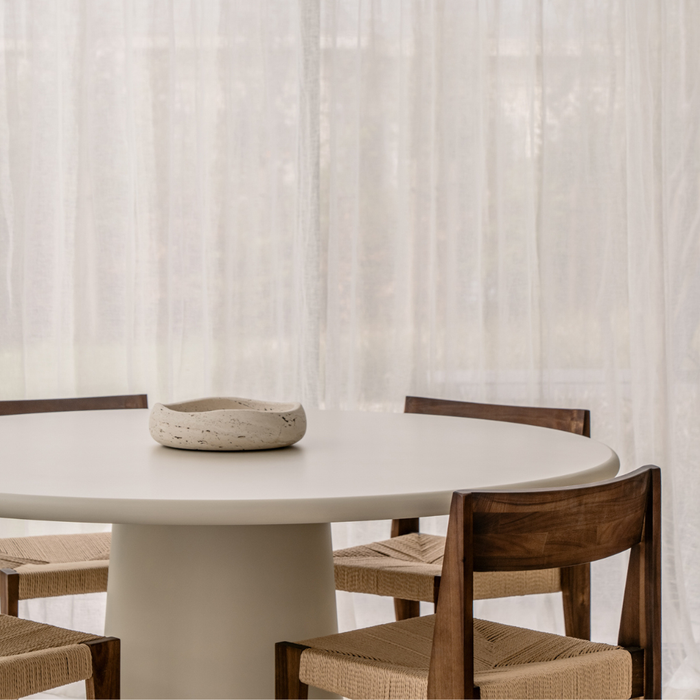 Mesa de comedor redonda Brocas efecto hormigón con pata cónica