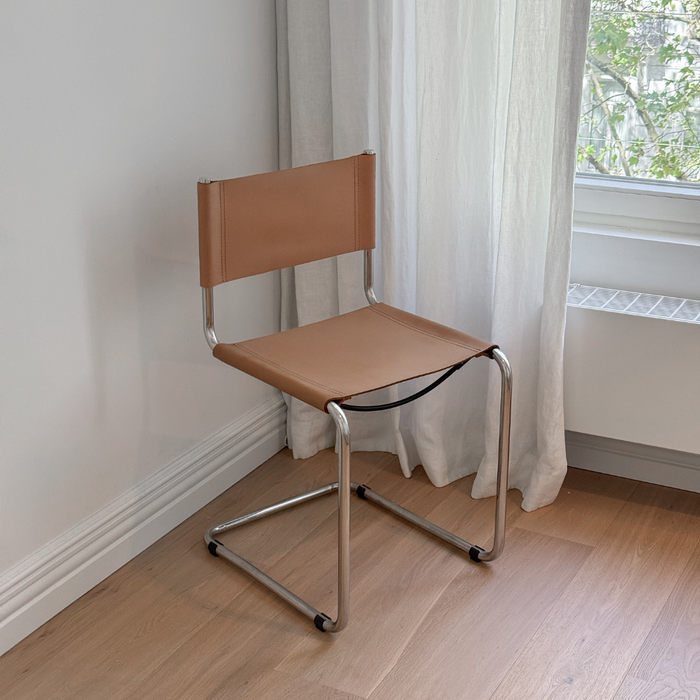 Swing dining chair, chrome, light cognac